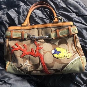 Cute coach fish collection bag